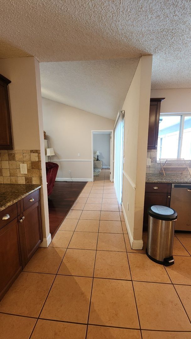 Building Photo - The Woodlands of Palm Coast- FURNISHED- 4 Bedroom 2 Bath- Long Term