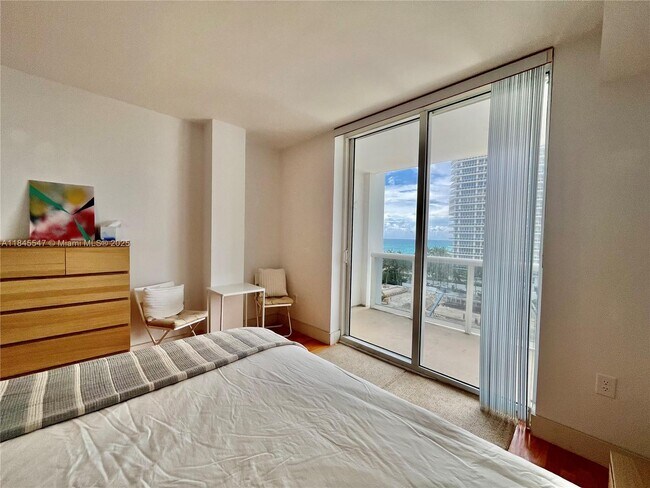 Building Photo - 10275 Collins Ave
