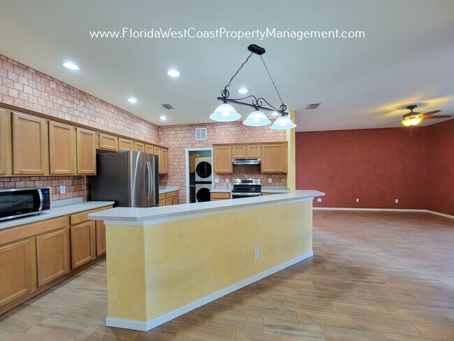 Building Photo - LARGE PARRISH POOL HOME! FENCED YARD! PET FRIENDLY! AVAILABLE FOR JUNE! LONG TERM LEASE!