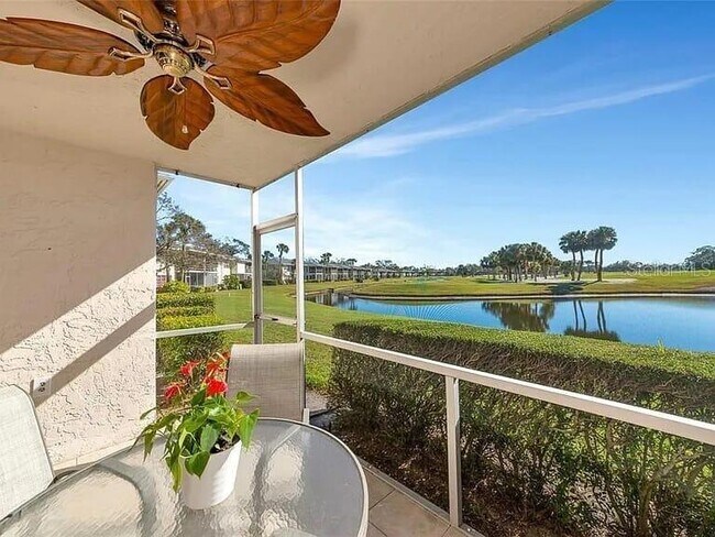 Building Photo - 6999 W Country Club Dr N