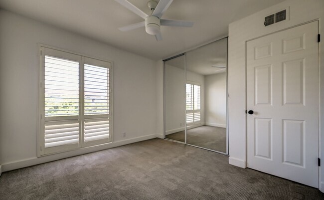 Building Photo - Updated, 3 bedroom 2.5 bath townhouse located in the Newport Riviera Community