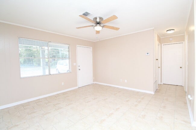 Building Photo - Updated 2BR/1BA Milton Triplex Unit Near Hwy 90 with Tile Flooring, Modern Bath Updates & Voucher...