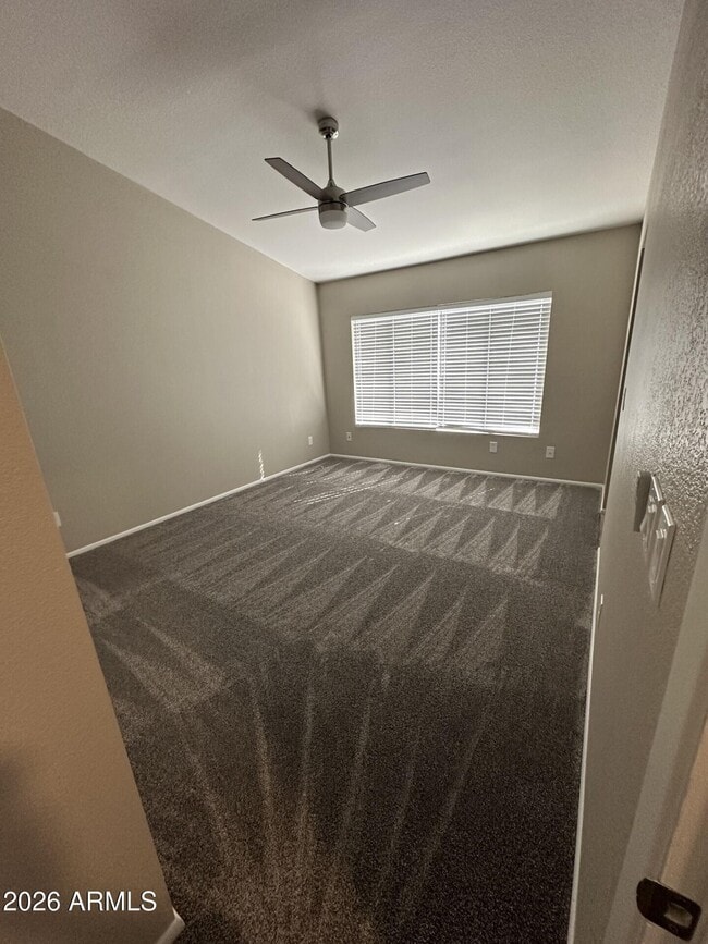 Building Photo - 8663 N 107th Dr