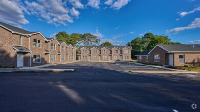 Building Photo - Now Showing: 2BR, 1 1/2BA townhome. (Do no...