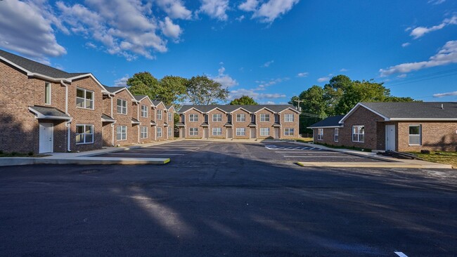 Primary Photo - Now Showing: 2BR, 1 1/2BA townhome. (Do no...