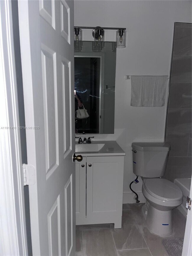 Building Photo - 3355 NE 13th Cir Dr