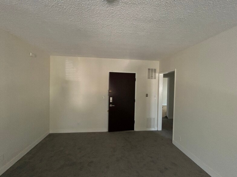 Entry Door to Living Room - 325 S Doheny Dr