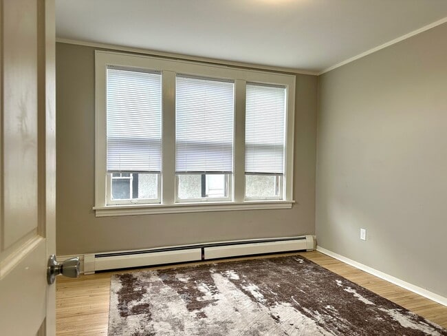 Building Photo - Available June 1st - Beautifully Renovated 4 Bed 1 Bath w/ Garage