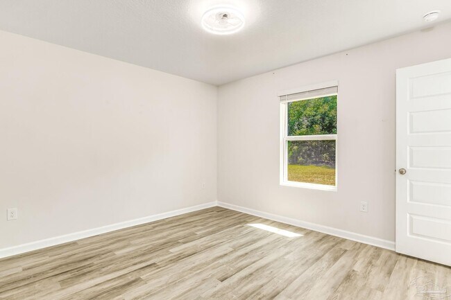 Building Photo - 6323 June Bug Dr