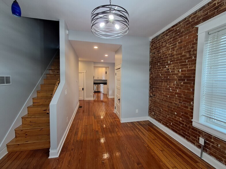 View from front room through dining to kitchen - 1007 E McCarty St