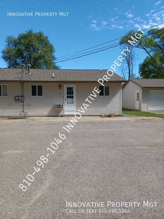 Building Photo - 3065 W Lake Rd