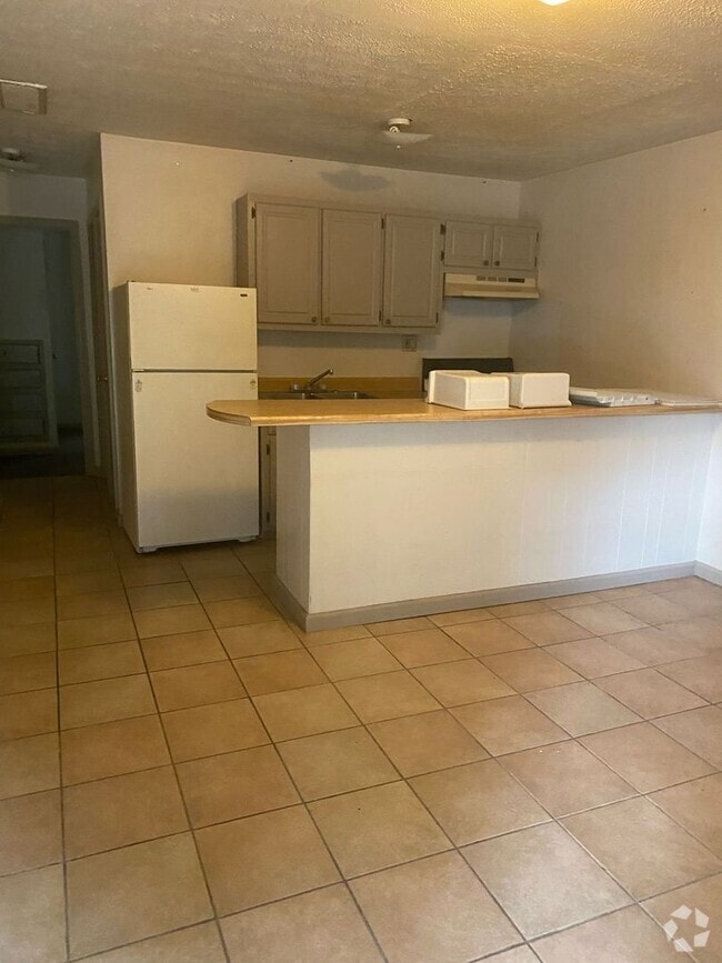 Building Photo - Monthly Paid Rent