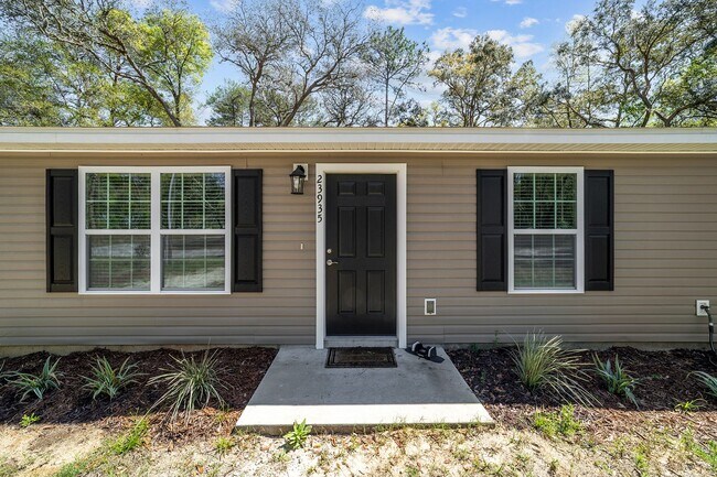 Building Photo - *** NOT READY FOR SHOW OR MOVE IN UNTIL AUGUST 1 *** Newer 3/2 in the country with fenced yard an...