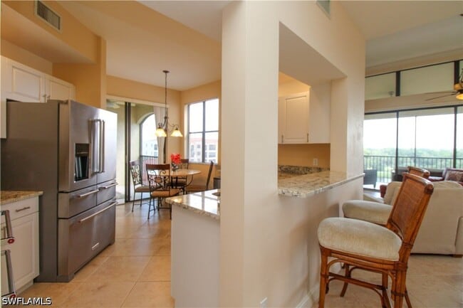 Building Photo - 7024 Pelican Bay Blvd