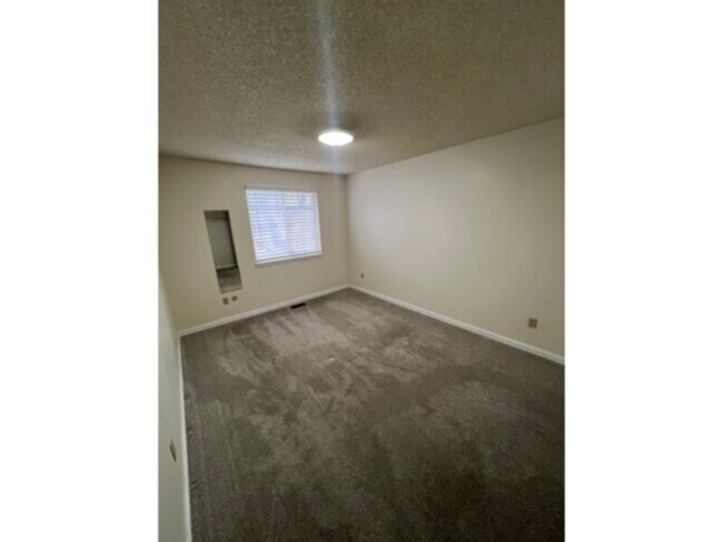 Building Photo - 9941 W Layton Ave