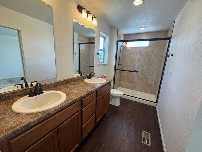 Building Photo - Luxury Corner Lot Home in Banning Lewis with Finished Basement, Wet Bar & Designer Upgrades