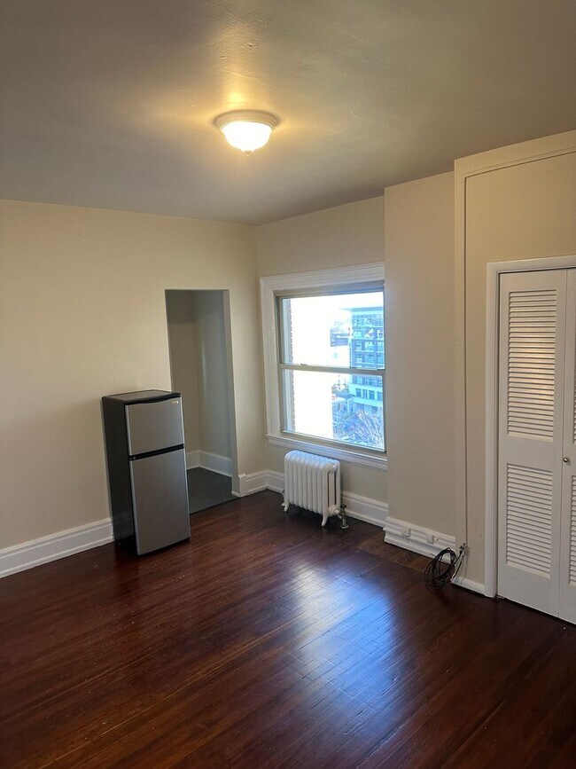 Building Photo - Studio Available All Utilities Included