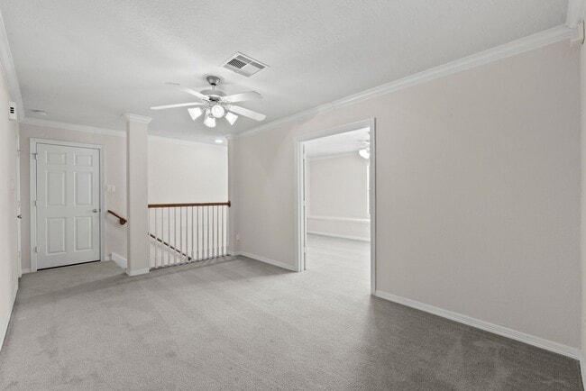 Building Photo - Stylish 3-Story Townhome with Covered Outd...