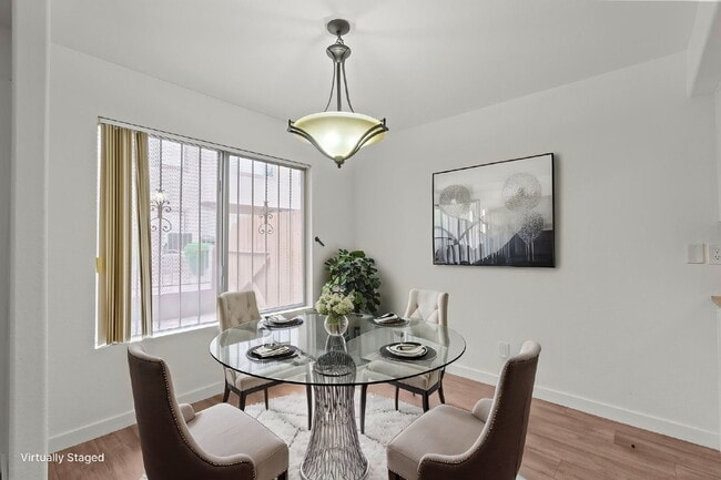 Building Photo - "Charming 3-Bedroom Townhouse Oasis with 2 Full Baths in Las Vegas – 1220 Sq Ft of Comfortable Li...