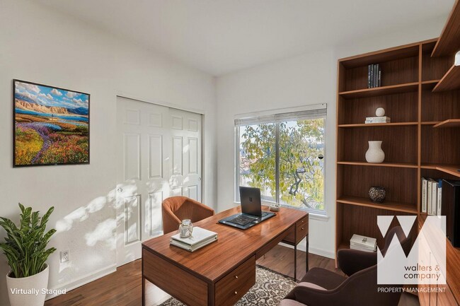 Building Photo - Light-Filled Corner Condo with Garage + Covered Parking in Gated Community