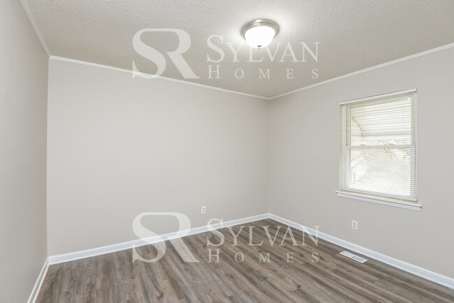 Building Photo - Prepare to fall in love with this 4 bedroom, 2 bathroom home