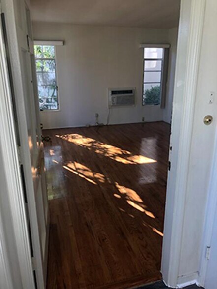 Front door of apartment and living room - 1237 N Brand Blvd