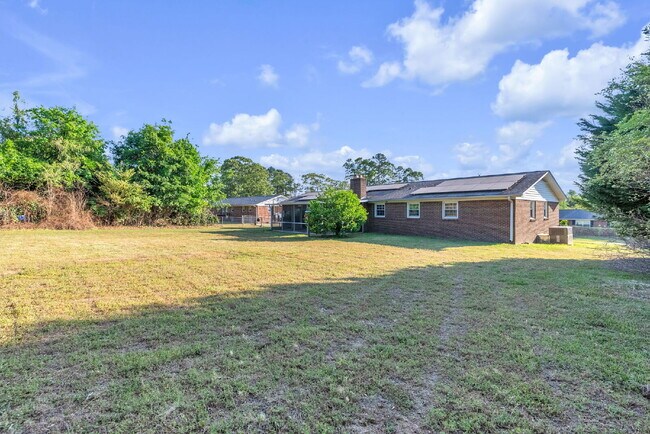 Building Photo - Spacious 3 Bedroom, 2 Bath Home with Dual Living Areas & Energy-Saving Solar Panels! $1900/mo rent