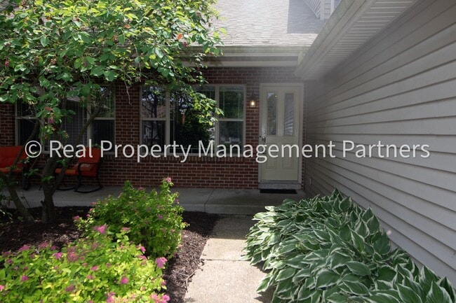 Building Photo - Spacious 3BR Townhome in Lowell | Nature Views & Maintenance-Free Living