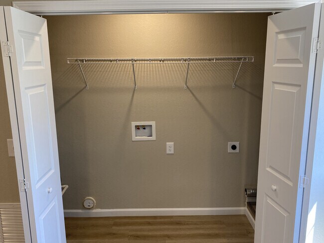 laundry closet off kitchen - Pleasant View Apartments on Carroll Creek