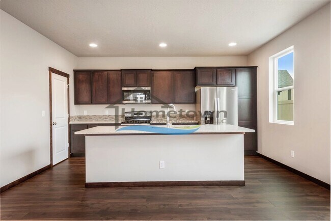 Building Photo - Woodbridge South Home with 4 Bedrooms and 3 Bathrooms in Post Falls build in 2021!