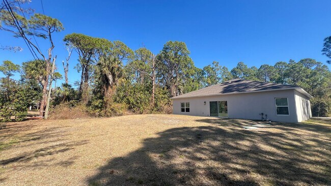 Building Photo - Spacious 4BR Home with Well Water, Pet-Friendly & No HOA