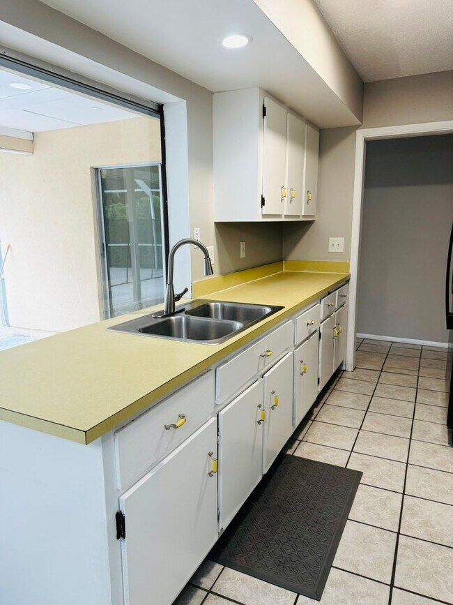 Building Photo - 3/2/1 POOL Home with Fenced Yard--Pool & Y...