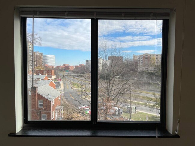 Dining Room window view, looks east to Rosslyn skyline; often used as WFH space - 1401 N Rhodes St