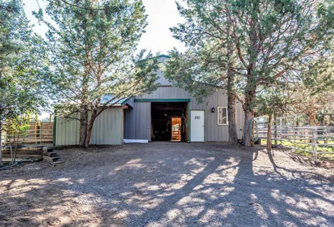Building Photo - Custom Rustic 4-Bdr on beautiful 5 acres with Greenhouse in Sisters!