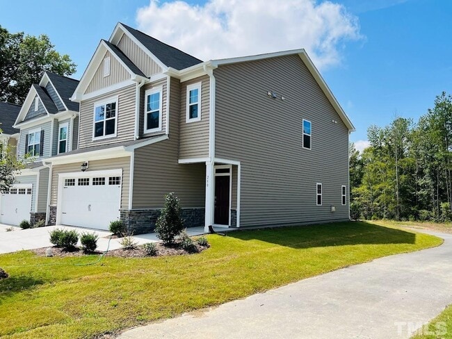 Building Photo - End Unit Townhome for Rent 3 bedroom Double Garage