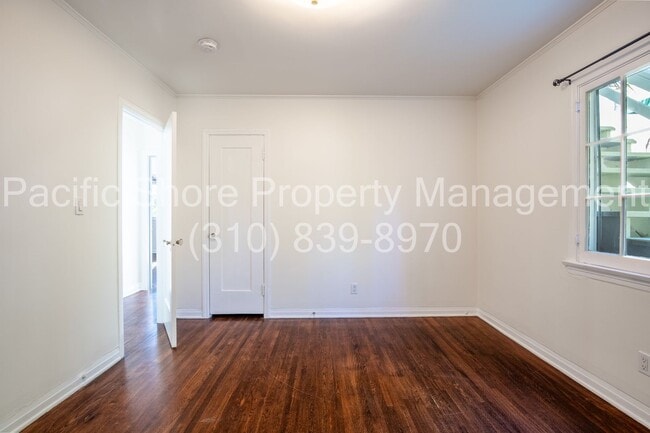 Building Photo - 8159 Willoughby Ave