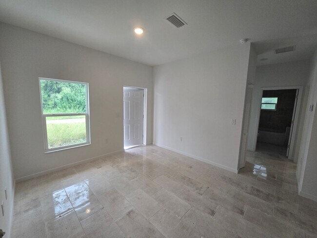 Building Photo - BRAND NEW 2/2/1 -SW LEHIGH ACRES