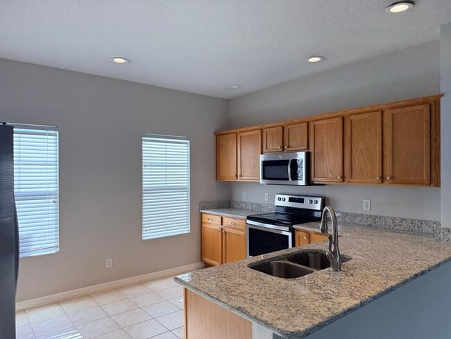 Building Photo - 1110 Oakpond, Celebration, FL 34747 4 bedroom/2 bath/2car garage