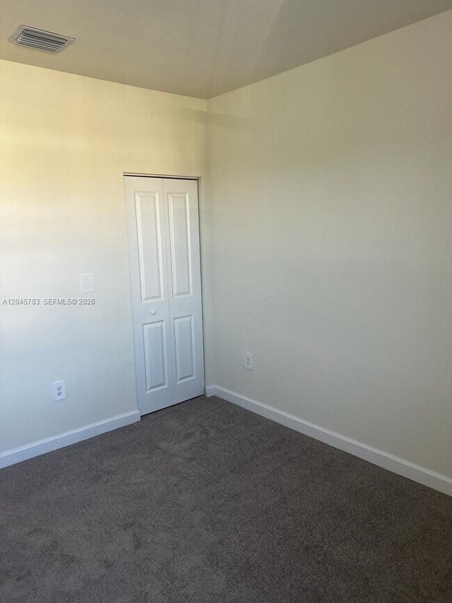 Building Photo - 11444 West 33rd Ct