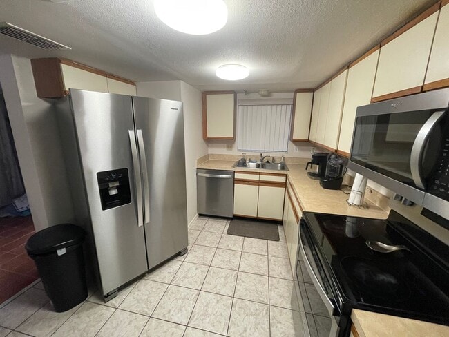 Building Photo - FULLY FURNISHED 3 Bed/2.5 Bath Condo at Carmel by the Lake AVAILABLE APRIL 1st!