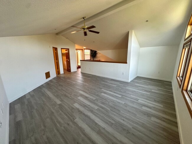 Building Photo - Stylish 3rd Level, Private 2 bedroom Apartment With LVP Flooring, Decks, Gas Fireplace & In-Unit ...