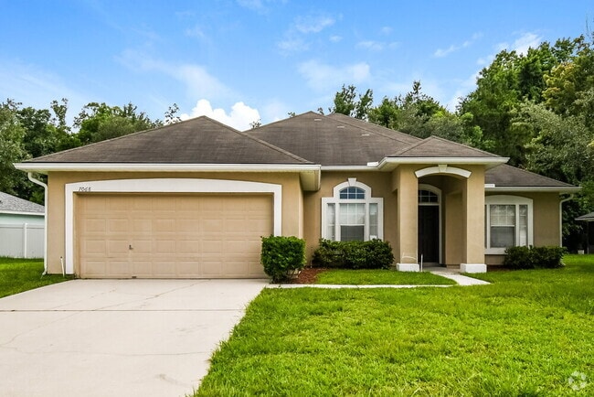 Building Photo - 7068 Rapid River Dr W