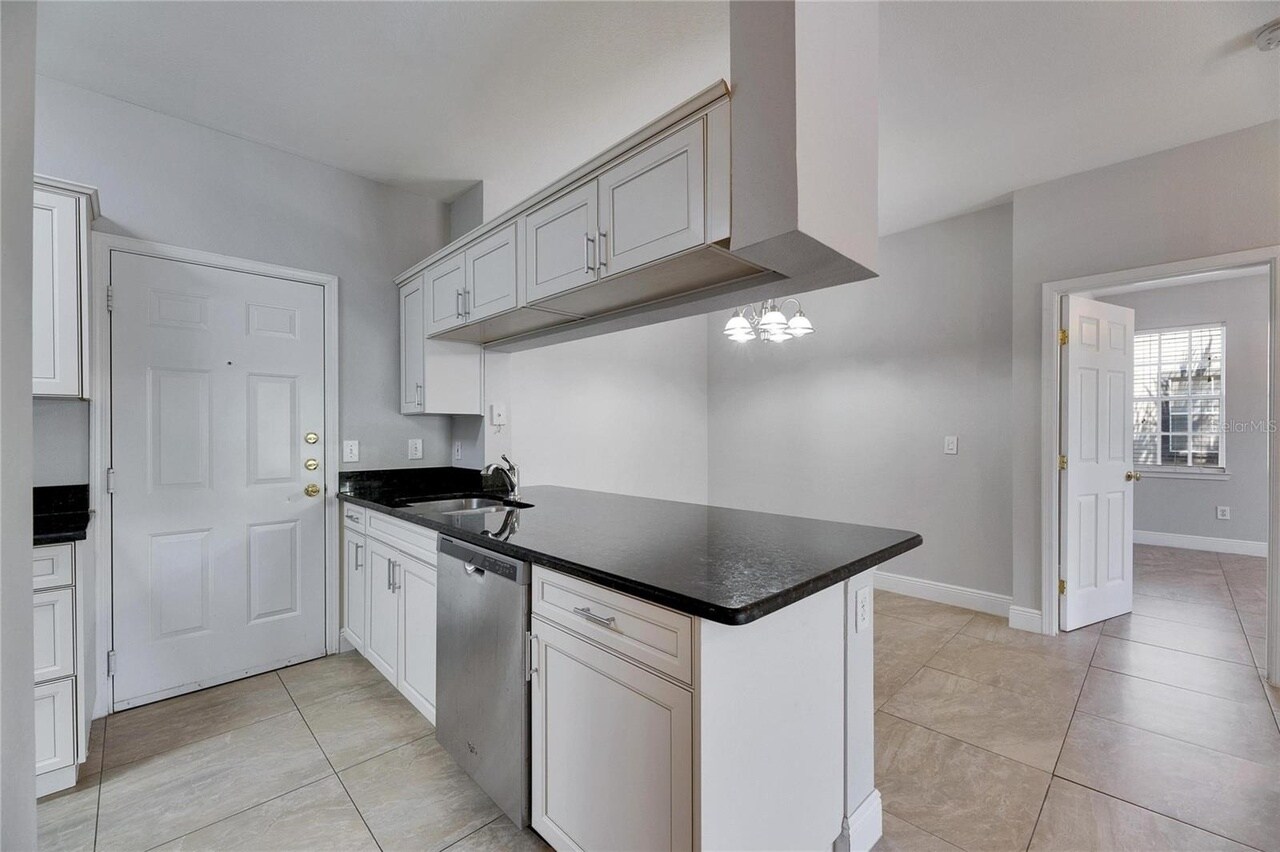 Door in the kitchen connecting to downstair garage - 13016 Sanctuary Cove Dr