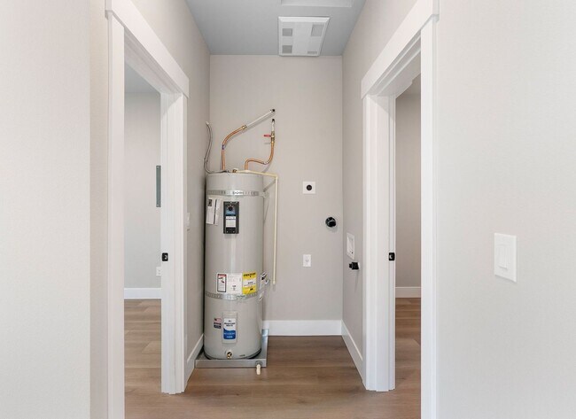Building Photo - Brand-New Detached 2 Bedroom Home with Private Fenced Yard and Designer Finishes
