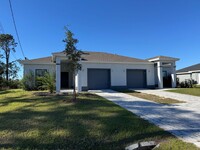 Building Photo - 3 Bed 2 Bath Duplex in Lehigh Acres