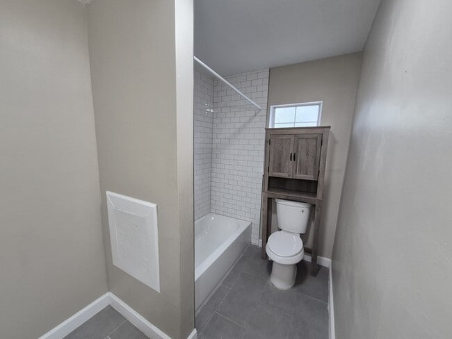 Building Photo - Spacious 4-Bedroom Home with Detached Gara...