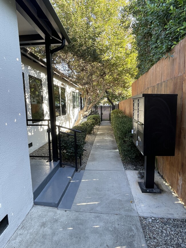 Front pathway with unit on the left - 3211 W Alameda Ave