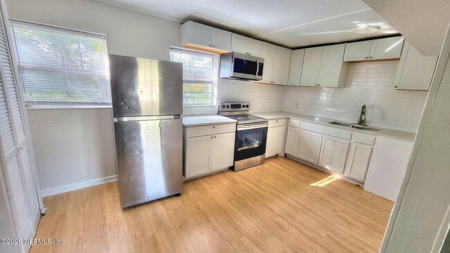 Building Photo - 9172 11th Ave