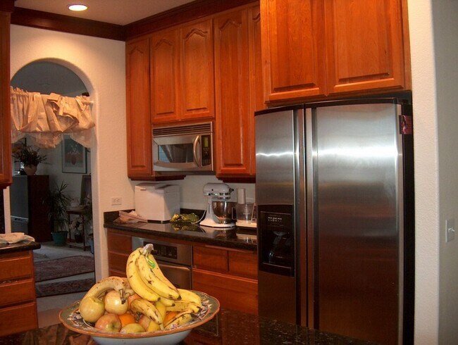 Building Photo - Centrally Located Custom Home each bedroom...