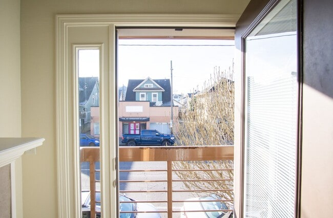 Building Photo - Corner 2 Bedroom with DW, W/D, Fireplace +...